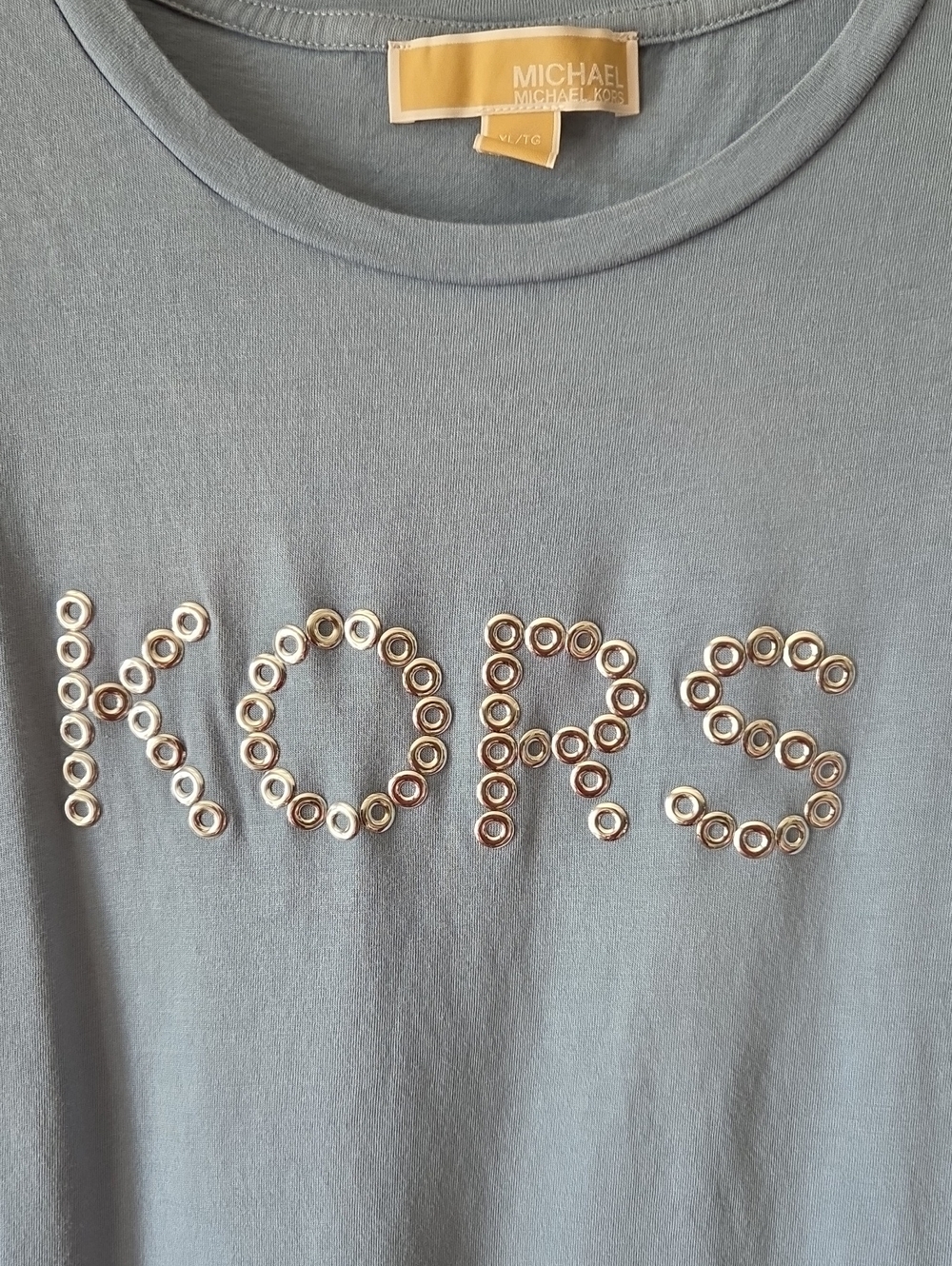 EUC!! Michael Kors Light Blue Logo Tee with Silver Eyelet Detail